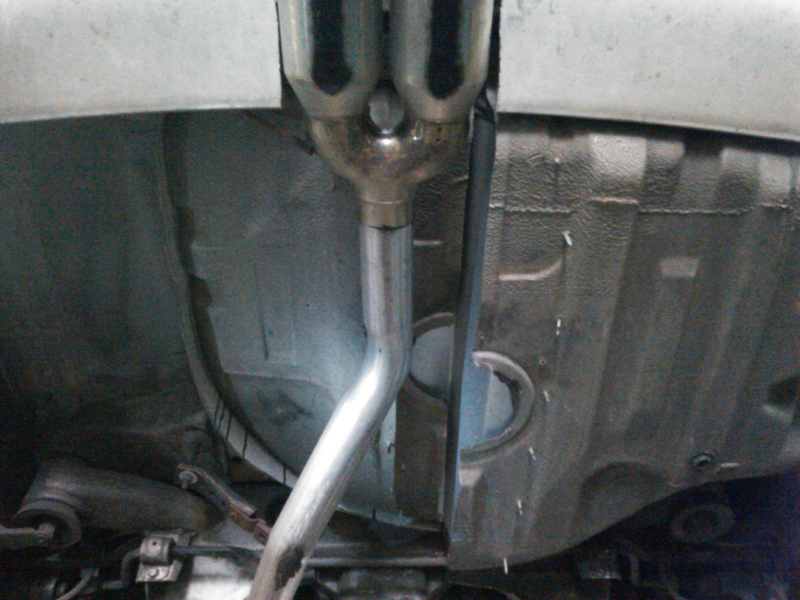 Illustration for article titled When you really, truly have to have a center exhaust on your E39